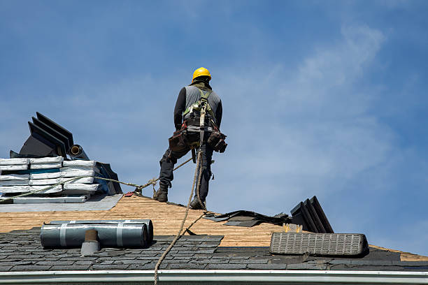 Professional Gutter Installation technician working in Greenlawn, NY